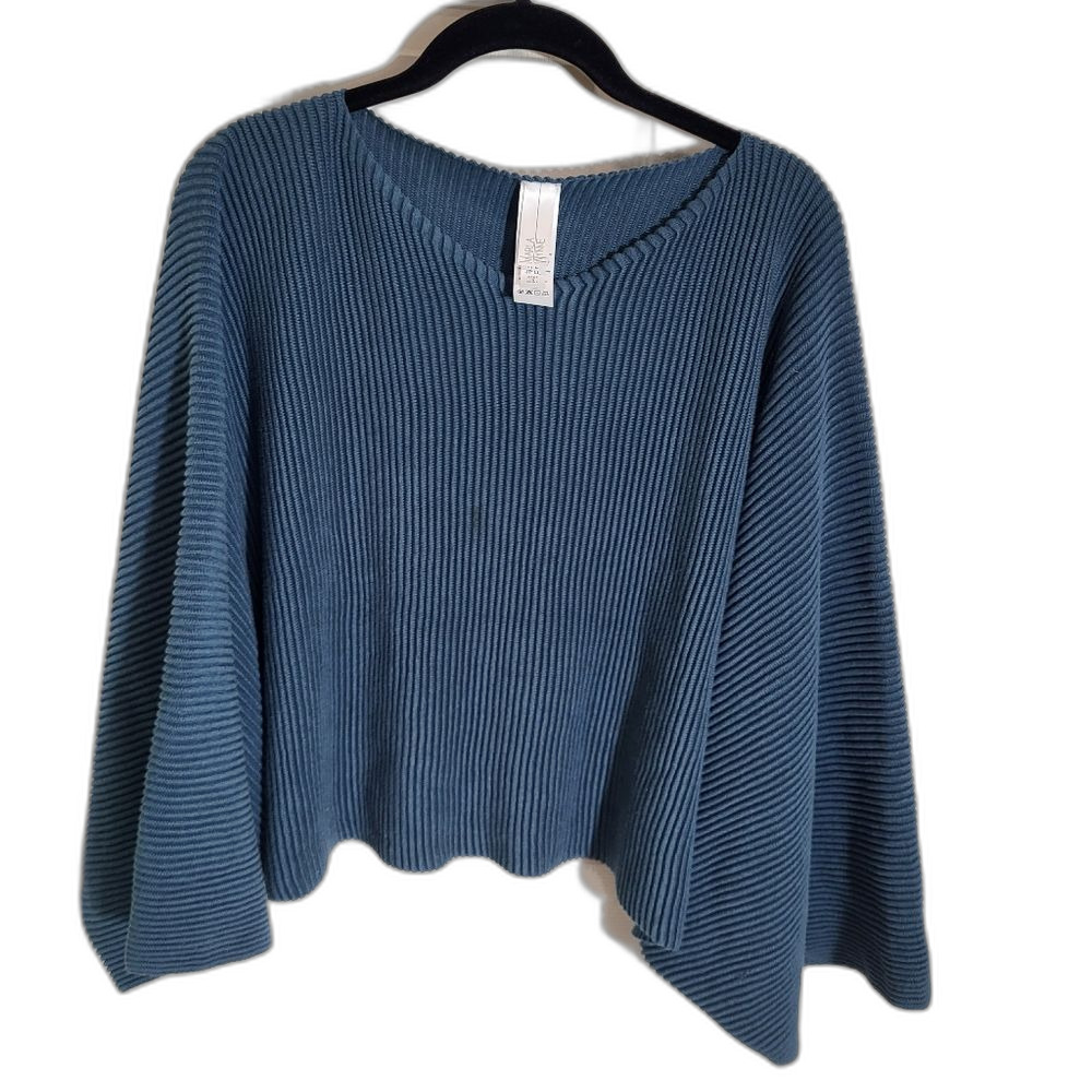 Cape by designer Marla Wynn